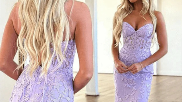 Lilac Gala Dress with 3D Lace and Sheer Corset Bodice A composite image showing the front and back of a young blonde woman wearing a lavender prom dress. The dress features a mermaid silhouette and a strapless corset bodice with sheer details and 3D floral lace appliqués. In the front view, she holds her hands together; in the back view, the zipper closure and low back detail are visible.
