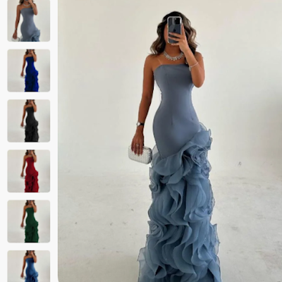 Prom dress azul elegante com folhos para baile de finalistas Mulher a usar um prom dress azul justo com folhos na saia, modelo elegante e moderno para baile de finalistas